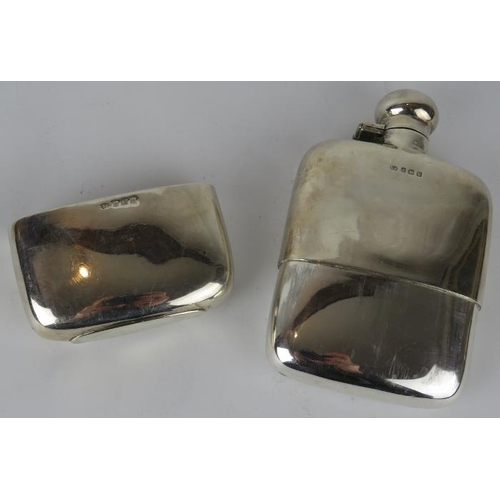 328 - A 1920s silver hip flask with removable silver cup.  Hallmarked for Birmingham 1920, maker Hubert Ha... 