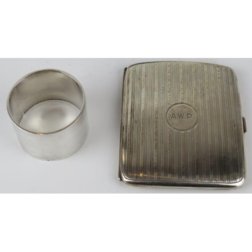 330 - A 1918 hallmarked silver cigarette case, a silver topped jar, silver napkin ring and a boxed mother ... 