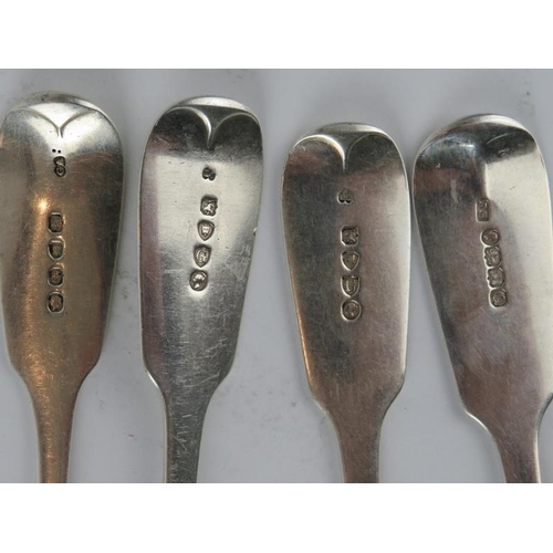 335 - Four  19th century silver fiddle pattern tablespoons with engraved crests.  Mixed hallmarks. Gross c... 