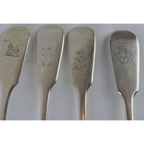 335 - Four  19th century silver fiddle pattern tablespoons with engraved crests.  Mixed hallmarks. Gross c... 