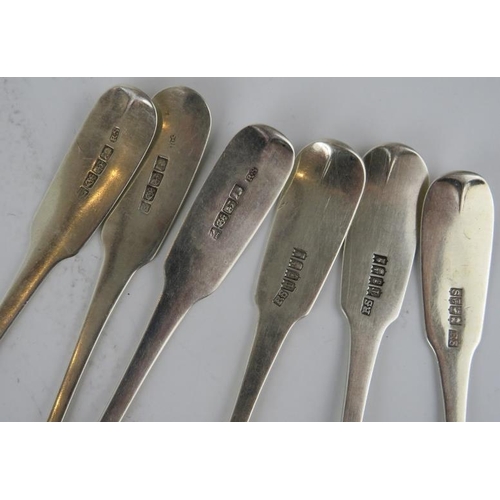 337 - Set of six fiddle pattern Irish silver dessert spoons, each engraved with a swan and arrow crest.  H... 