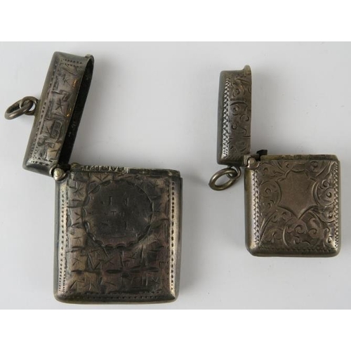 340 - Two golf themed silver vesta cases, one with an embossed image of a golfer, hallmarked Chester 1906 ... 