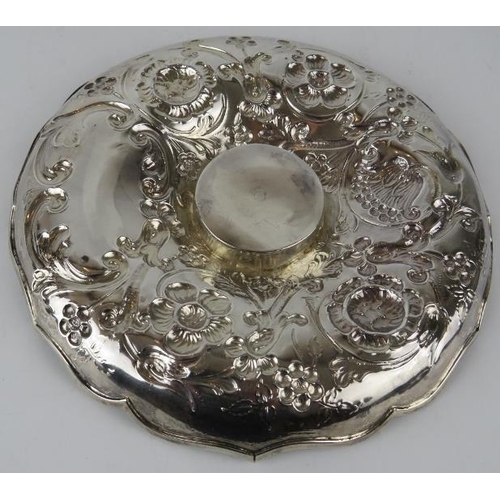 343 - A late 19th century repousse silver dish with floral decoration. Hallmarked for London 1893, maker A... 