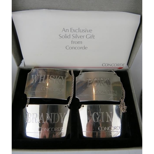 349 - A boxed set of four British Airways Concorde silver decanter labels, hallmarked for Birmingham 1986,... 