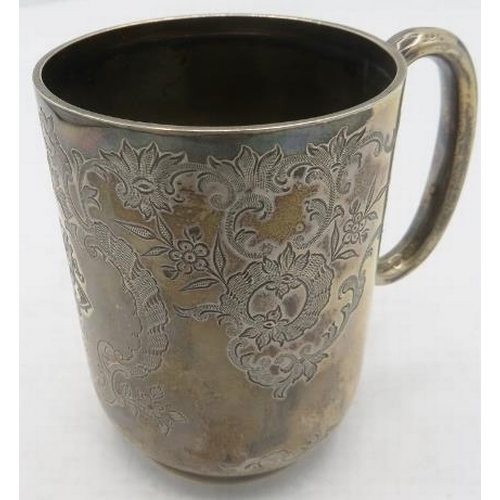 353 - A silver christening mug with 'C' shaped handle and foliate engraved decoration, monogrammed, Sheffi... 