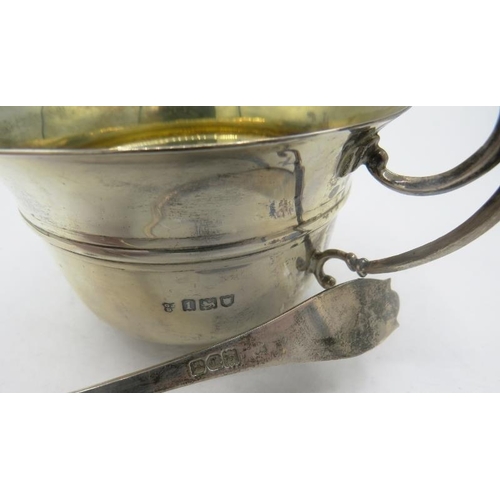 365 - A silver porringer with gilded interior and matching silver spoon. Engraved on the side, London 1906... 