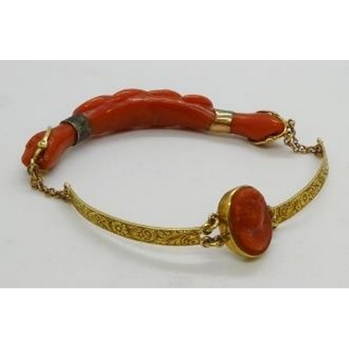 369 - A late 19th century Continental carved coral snake bracelet with yellow metal engraved bars and carv... 