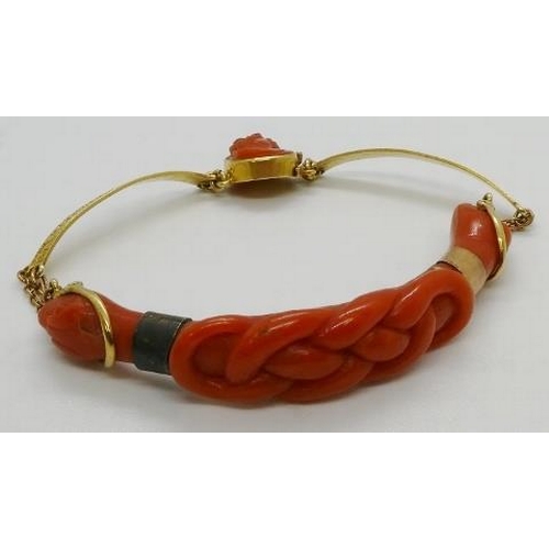 369 - A late 19th century Continental carved coral snake bracelet with yellow metal engraved bars and carv... 