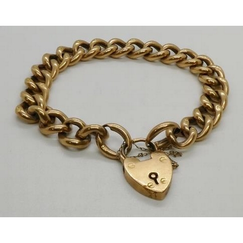 372 - A 9ct gold curb-link bracelet , with padlock clasp, 240mm long, Birmingham 1907, links stamped 9C, 2... 