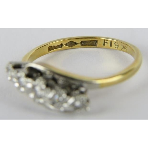 390 - A 5 stone diamond ring, approx. 0.050cts in 18ct yellow and white gold, finger size O 3.3gms All wei... 