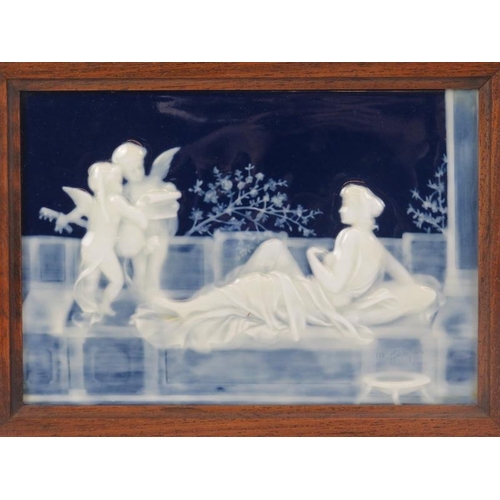 40 - A Limoges pâte-sur-pâte porcelain wall plaque, early 20th century. Depicting a garden terrace scene ... 