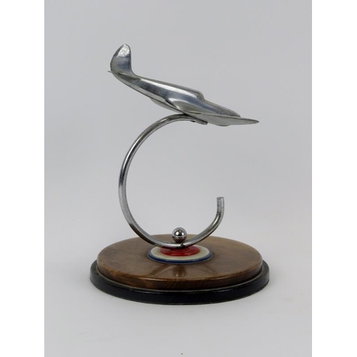 46 - Aviation memorabilia: An RAF Spitfire desktop ornament, mid 20th century. Modelled in chrome and sup... 