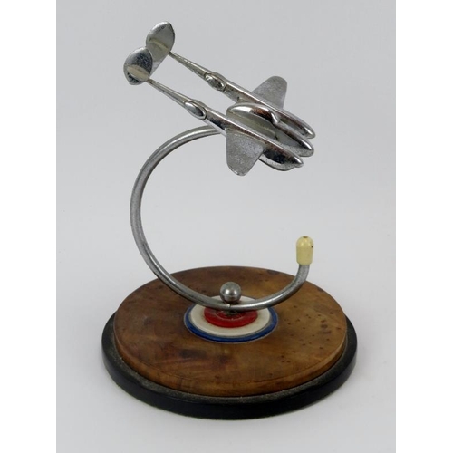 47 - Aviation memorabilia: A USAAC Lockheed P-38 Lightning desktop ornament, mid 20th century. Modelled i... 