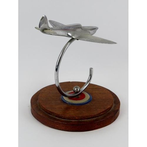 48 - Aviation memorabilia: An RAF Spitfire desktop ornament, mid 20th century. Modelled in chrome and sup... 