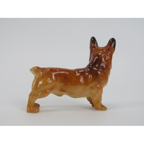 56 - A Royal Worcester porcelain’ Yellow Labrador’ by Doris Lindner and two miniature dog figurines. Comp... 