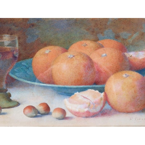 575 - Fred Spencer (Act. c1900-1904) - An ornate framed & glazed watercolour, 'Still life of oranges in a ... 