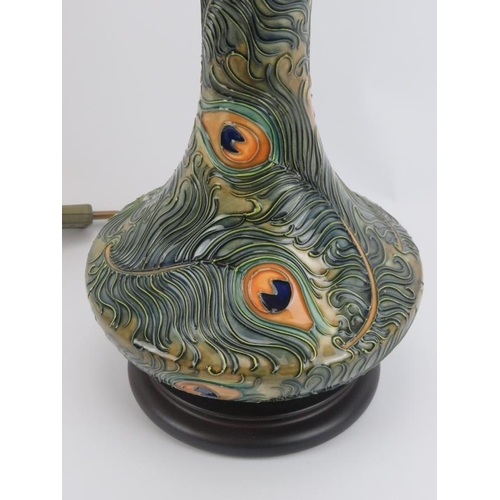 70 - A Moorcroft ‘Phoenix’ pattern table lamp designed by Rachel Bishop, circa 1997. Tubeline decorated w... 