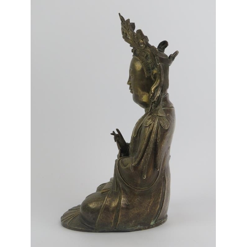 77 - A large Chinese bronze figure of Guanyin, 19th century or earlier. Stylistically similar to Ming Dyn... 