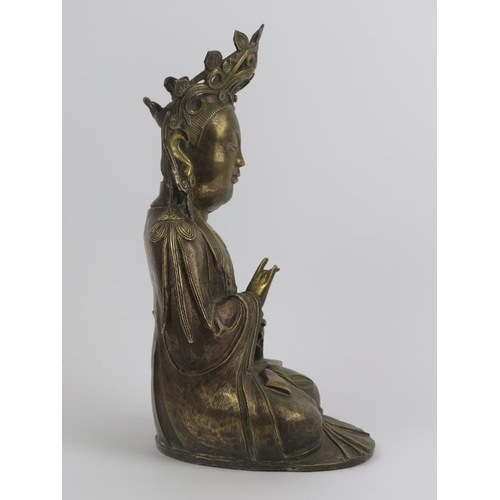 77 - A large Chinese bronze figure of Guanyin, 19th century or earlier. Stylistically similar to Ming Dyn... 