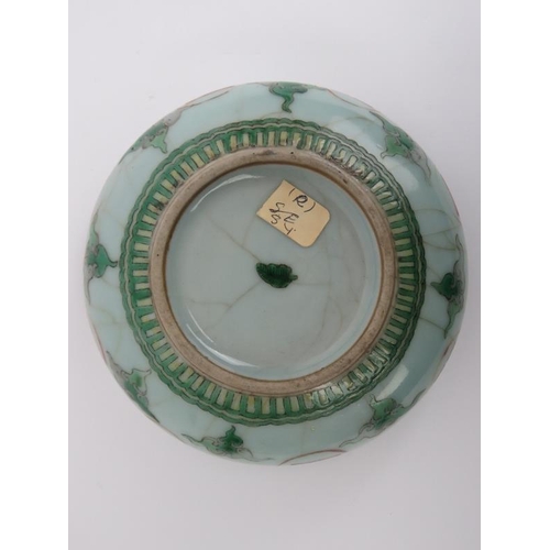 78 - A Chinese crackle glazed celadon porcelain ‘Bagua’ bowl, 19th century. Decorated with cranes amongst... 