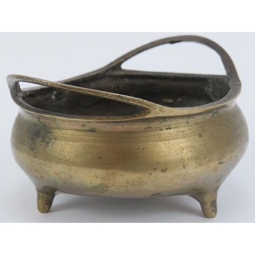 81 - A Chinese polished bronze bombe censer, 19th century. Imperial Xuande (1426 - 1435) reign mark in zh... 