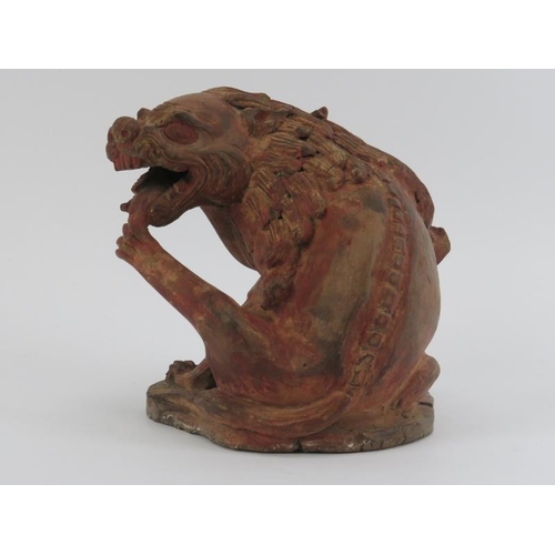 84 - A Chinese terracotta sculpture of a Buddhistic lion, possibly 19th century. Provenance: Purchased fr... 