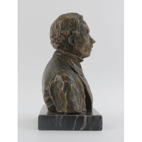 85 - A bronze bust of a gentleman, late 19th/early 20th century. Supported on a marble base of later date... 