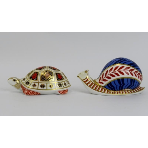 89 - A Crown Derby porcelain tortoise and a snail paperweight. (2 items) 12 cm length, 13 cm length. 
Con... 