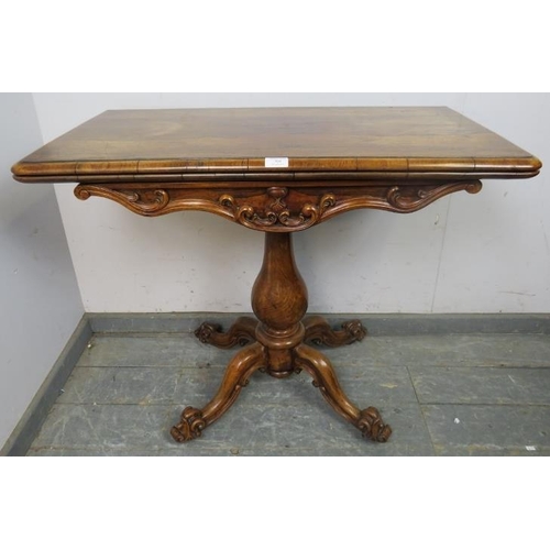 704 - A good early Victorian rosewood turnover tea table, having acanthus carved and scrolled frieze in hi... 