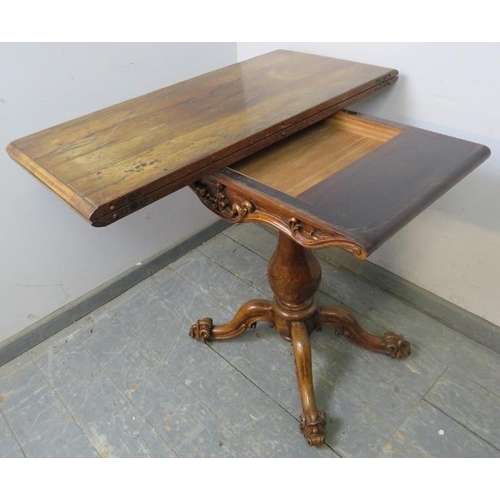 704 - A good early Victorian rosewood turnover tea table, having acanthus carved and scrolled frieze in hi... 