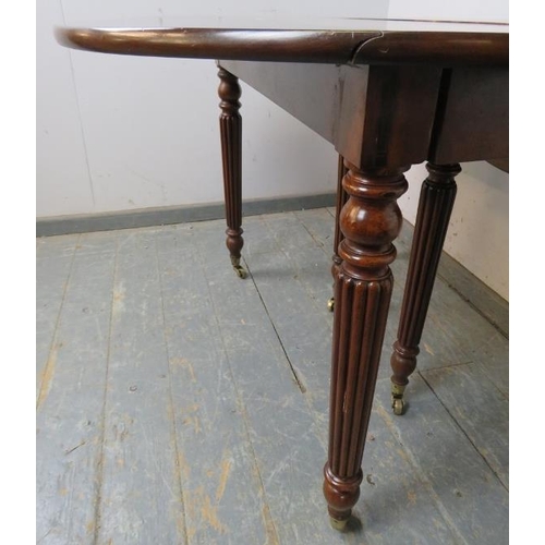 712 - A good Regency Period Cuban mahogany extending dining table in the manner of Gillows, with concertin... 