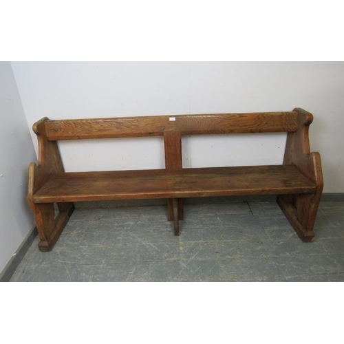 739 - An antique elm & pitch pine pew/hall bench, having carved end supports in the manner of Pugin. 
H80c... 