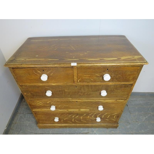 742 - A Victorian pine chest retaining the original scumbled paintwork, housing two short over three long ... 