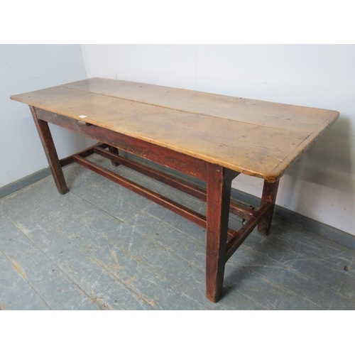 743 - A 19th century light elm farmhouse table of compact proportions, the planked top on square supports ... 