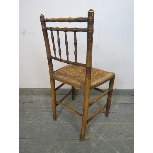 745 - A Regency Period faux bamboo occasional chair, retaining the original polychrome paintwork and rush ... 