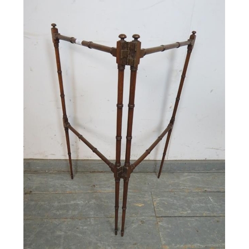 747 - A fine 19th century mahogany faux bamboo double hinged folding towel rail, on tapering supports. 
H7... 