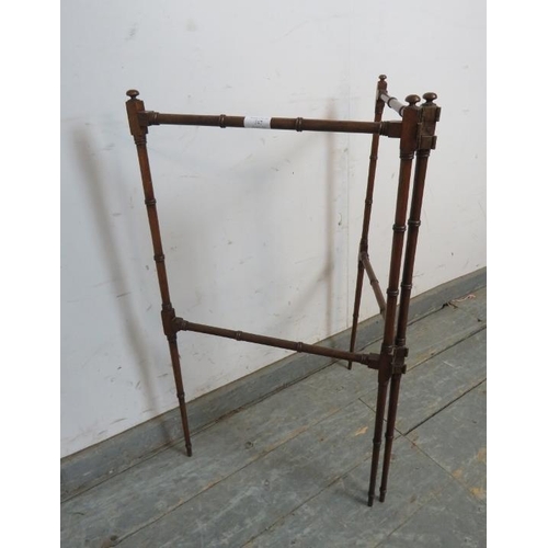 747 - A fine 19th century mahogany faux bamboo double hinged folding towel rail, on tapering supports. 
H7... 