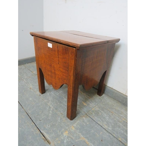 754 - An 18th century and later fruitwood commode, with shaped apron, on inner chamfered square supports.
... 