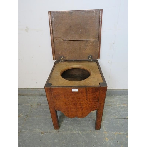 754 - An 18th century and later fruitwood commode, with shaped apron, on inner chamfered square supports.
... 