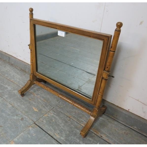 758 - A Regency Period faux bamboo swing vanity mirror, retaining the original polychrome paintwork, on sp... 