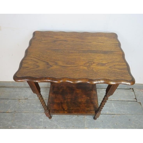 759 - A vintage oak two tier hall table, with piecrust edge, on barley twist supports. 
H73cm W58cm D42cm ... 