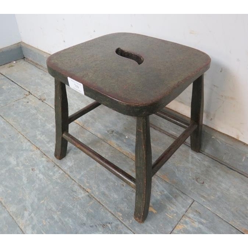 760 - A small 19th century ebonised stool, possibly Welsh, on splayed square supports with stretchers. 
H2... 