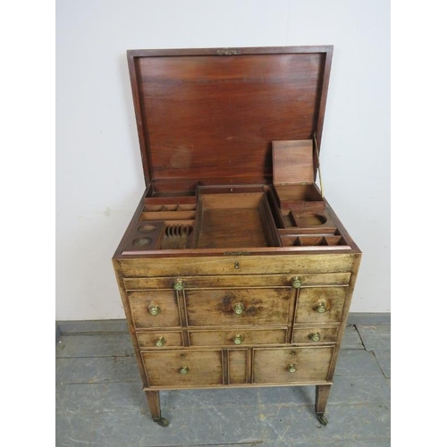 761 - A good George III mahogany gentleman’s washstand, the hinged top opening to reveal a fitted interior... 