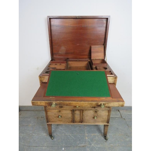 761 - A good George III mahogany gentleman’s washstand, the hinged top opening to reveal a fitted interior... 