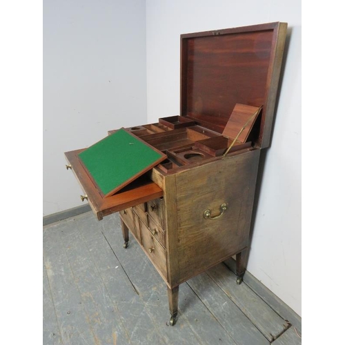 761 - A good George III mahogany gentleman’s washstand, the hinged top opening to reveal a fitted interior... 