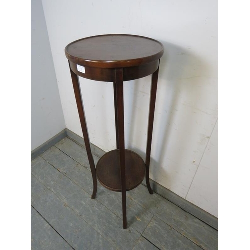 770 - A vintage mahogany two-tier jardinière/plant stand with dished top, on splayed square supports. 
H10... 