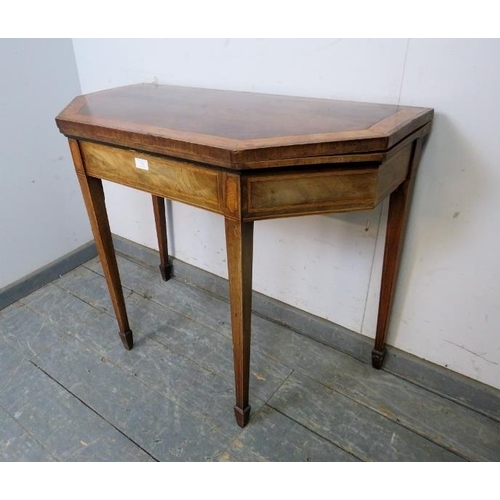 774 - A George III mahogany and satinwood octagonal folding card table, crossbanded and strung with ebony ... 