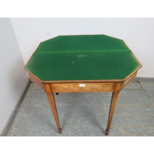 774 - A George III mahogany and satinwood octagonal folding card table, crossbanded and strung with ebony ... 