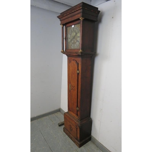 775 - An 18th century oak cased 30-hour longcase clock by Donisthorpe, the hood with stepped cornice above... 