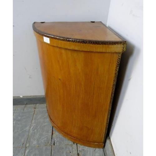 778 - An antique plywood corner laundry bin, the hinged lid with gilt metal mounts, on a plinth base. 
H63... 